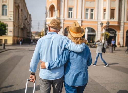 Elderly couple travelling