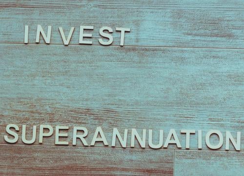 Invest In Superannuation Written On Timber 