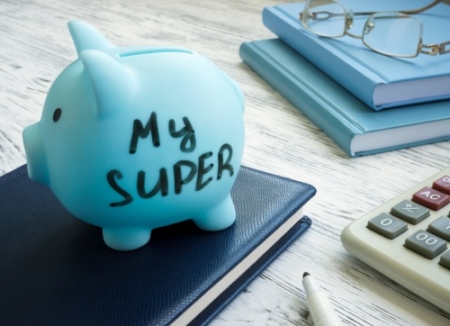 blue aesthetic, piggy bank says My Super, books, glasses and calculator 