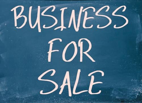 business for sale written on a black board