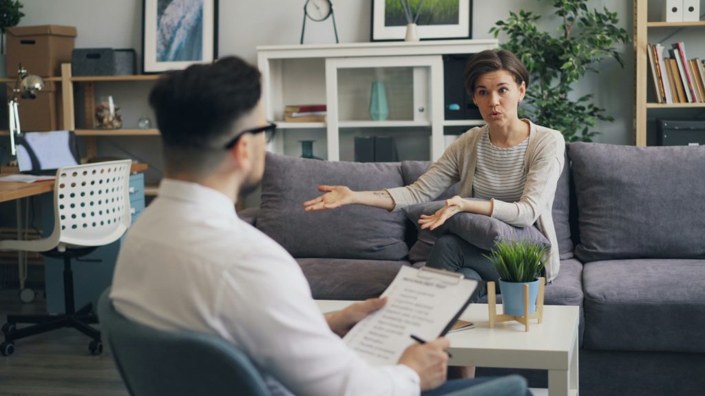 Woman meeting with financial advisor to discuss protecting superannuation during divorce